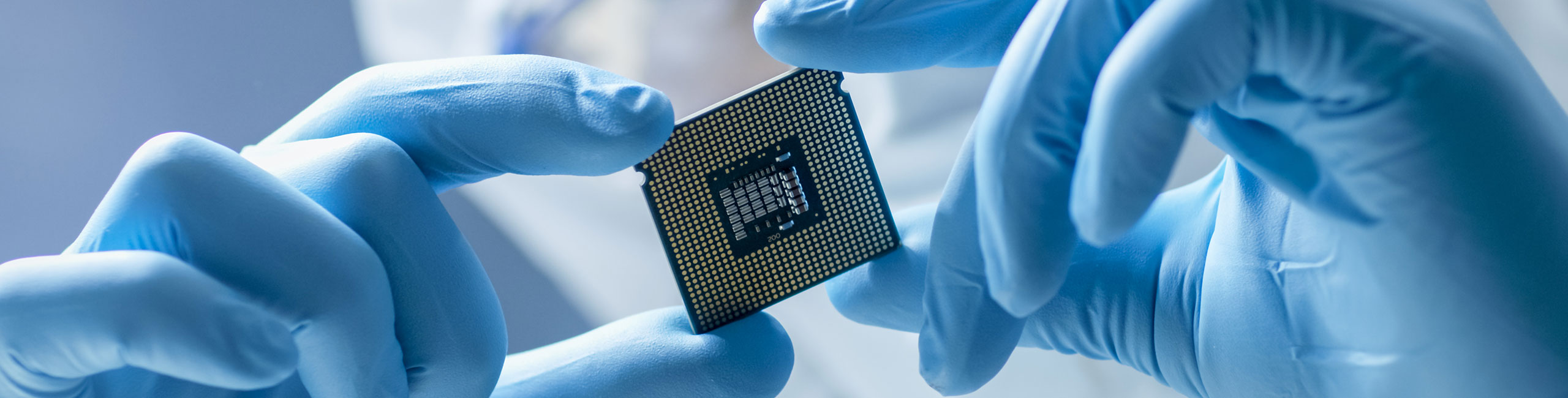 Semiconductor Fab Silicon Wafer Chip held by Operative
